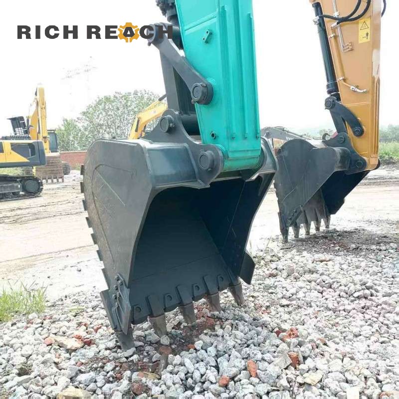 Operator seat and control consoles of a 2017 Kobelco SK350LC excavator, priced at $34,722